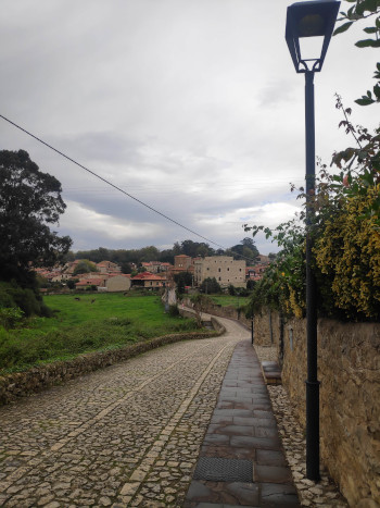 Santillana del Mar. Winding cobbled path leads to the town.